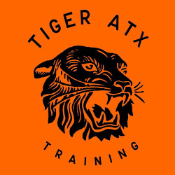 south austin chiropractor at tiger atx training logo